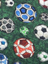 Close up of red, black, green, blue and white soccer balls.