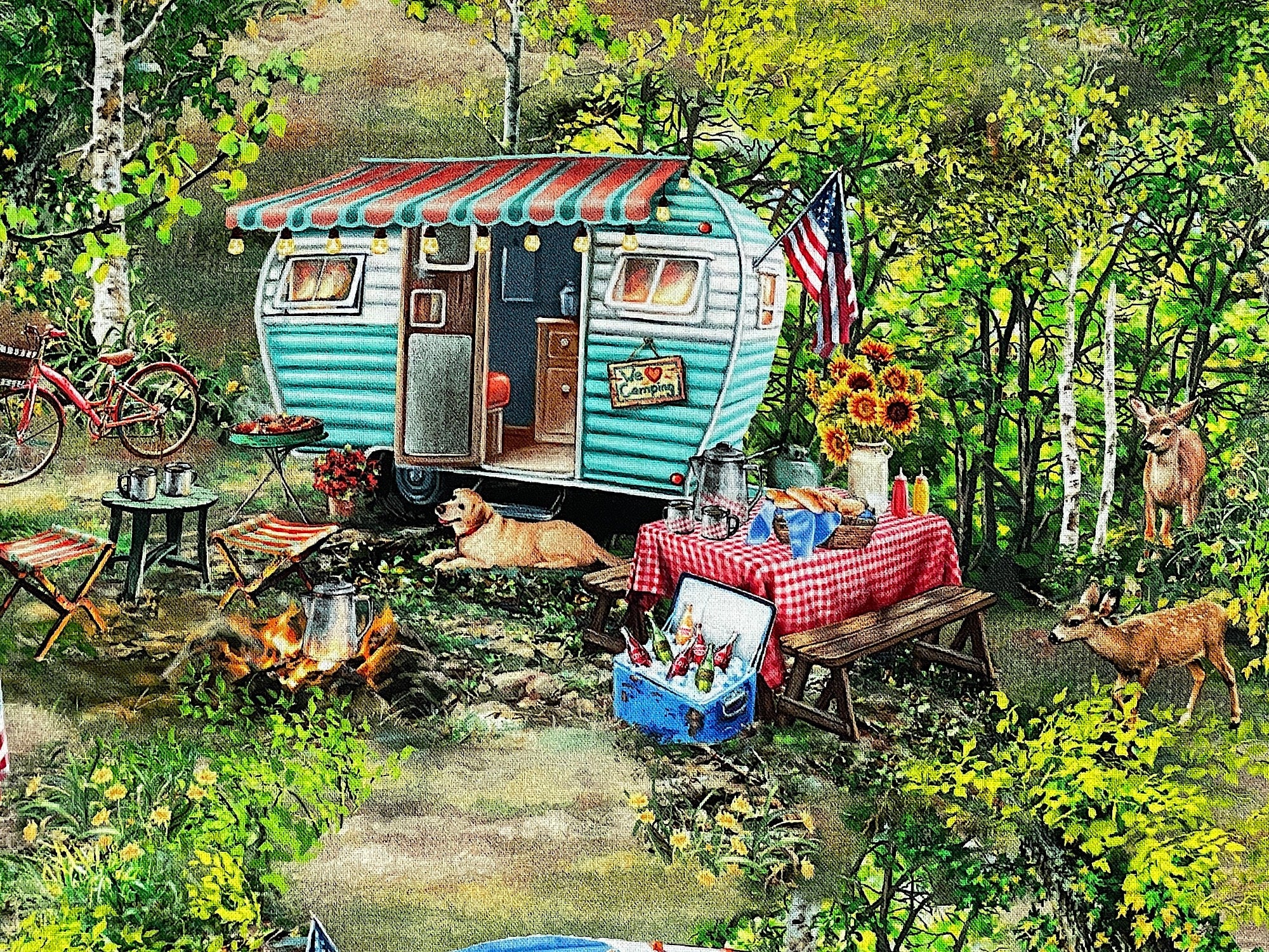 Close up of a camping scene that has a travel trailer, deer, picnic table, cooler filled with beverages and more.